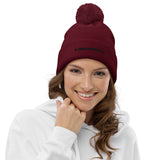 Bonnet bordeaux à pompon pour femme