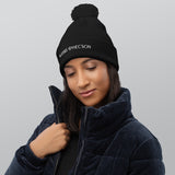 Bonnet noir à pompon pour femme à petit prix doux et confortable